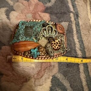4 x 3 inch belt buckle fits onto 1 1/2 inch belt you supply Turquoise colors